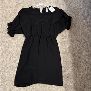 Elegant Black Dress with Ruffle Sleeves